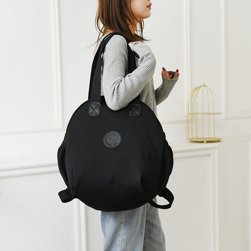 KARINAQ-Sac à dos rond